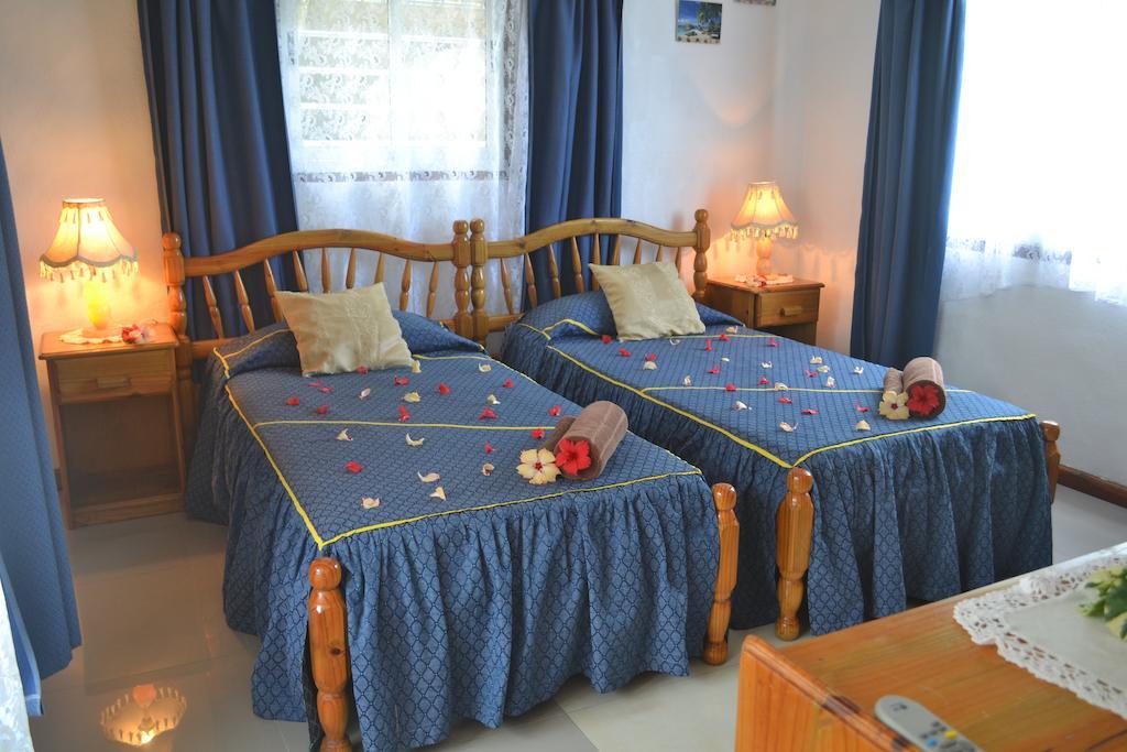 Calypha Guest House De Quincey Village Room photo